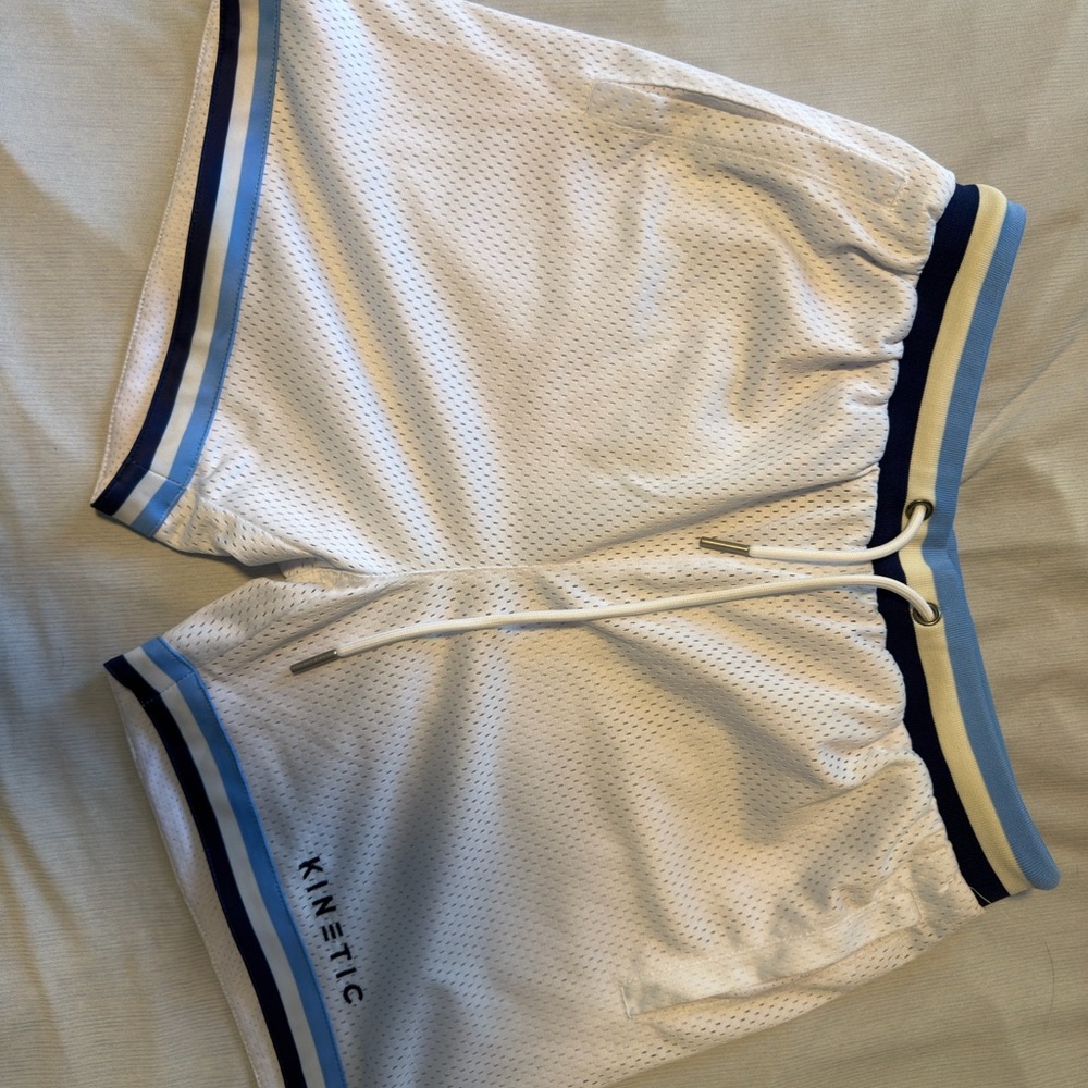Kinetic White Athletic Shorts with Blue Stripes